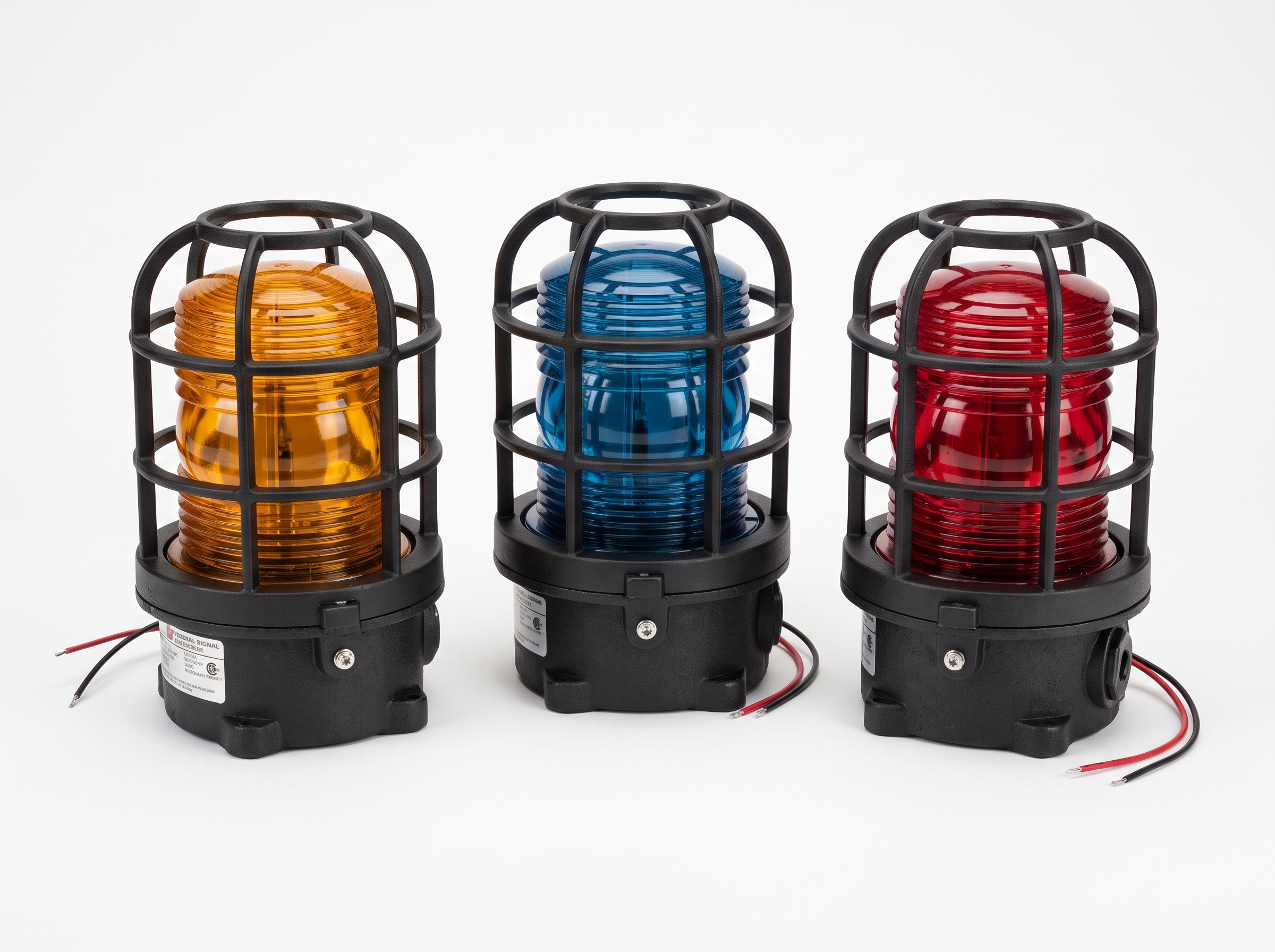 A hazardous location strobe light featuring an amber glass dome enclosed in a protective black metal cage, mounted on a heavy-duty black cylindrical base with a threaded conduit entry, isolated on a white background.