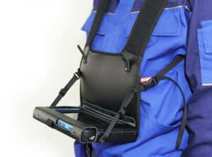 Black top-grain leather chest harness with cushioned shoulder straps and adjustable buckles, designed for hands-free carry of the Ecom Tab-Ex 05 tablet.