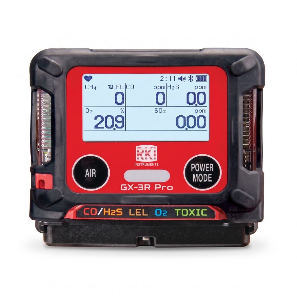RKI Instruments GX-3R Pro personal 5-gas monitor featuring a red front faceplate, digital LCD display showing real-time gas readings, and operational control buttons against a plain white background.